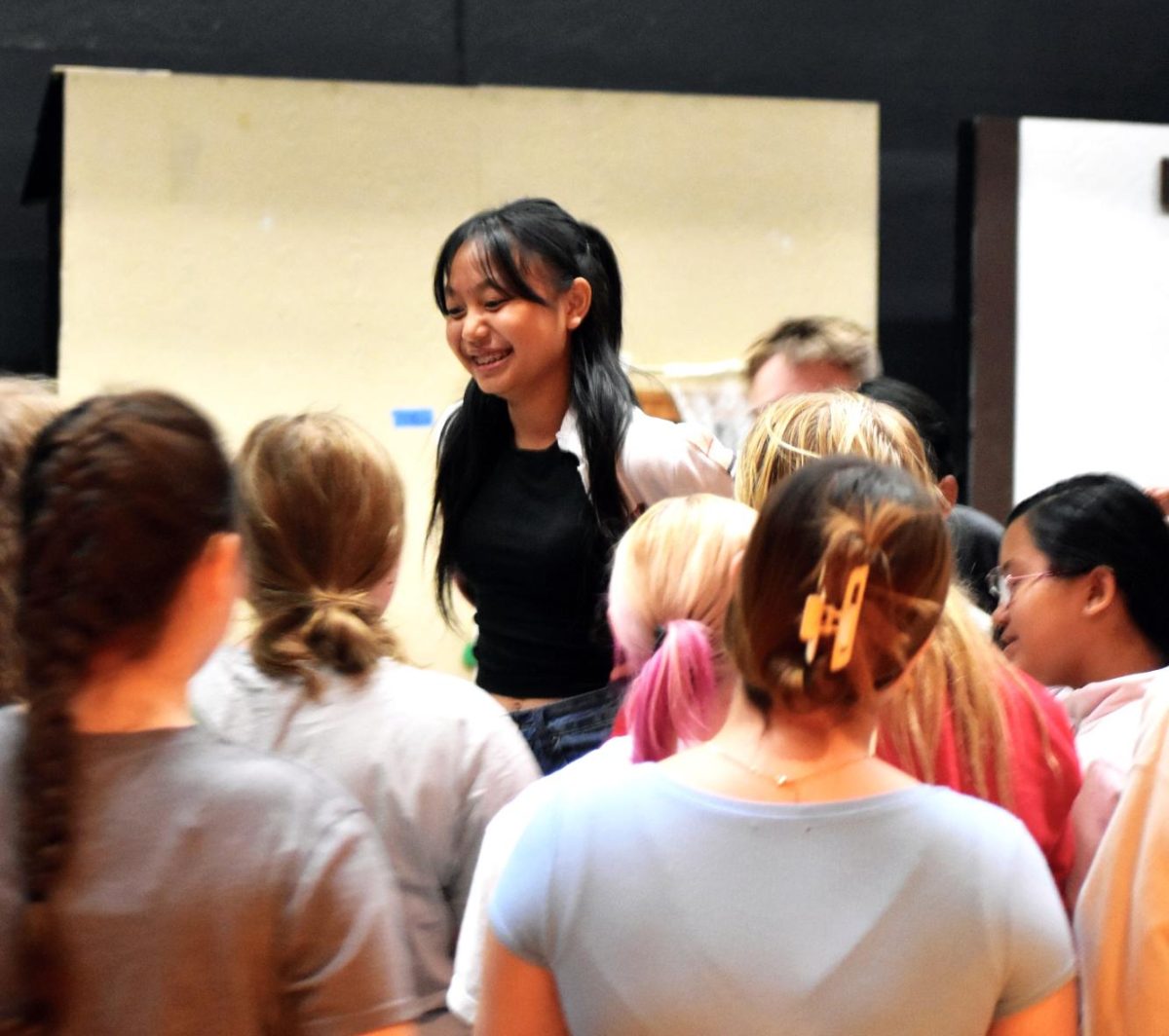 On September 20, the cast of Albert Lea High School's "Mean Girls" musical production had a full cast practice in the auditorium. The new cast bonded together performing trust falls in front of the whole room. Sophomore Eh Snow recites her lines in front of her fellow castmates. The musical will premiere on Nov. 21, continuing through November 23, at the Albert Lea High School auditorium. This will be Mary Schoppers first time directing the fall musical.