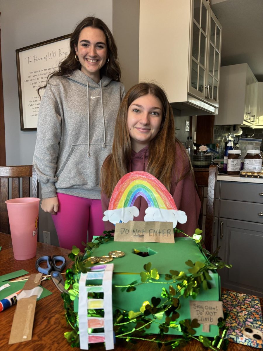 Sophomores Evelyn Koepke and Claire LaFrance pictured after building their leprechaun trap.